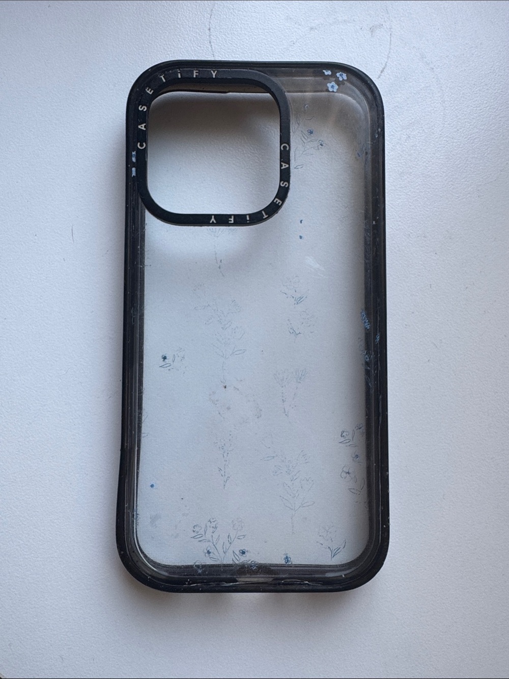 Casetify iPhone 15 Pro Case with Black Bumper and Subtle Blue Floral Accents